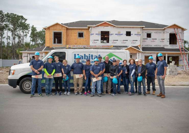 Diamond Custom Homes staff group united with Habitat for Humanity Collier